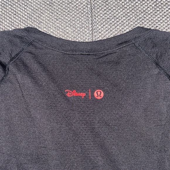 Disney Tops - Rare Disney x Lululemon Black Top